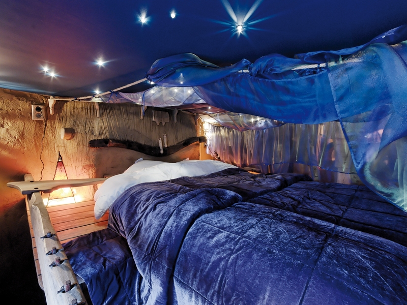 Illustration for article titled This fantasy-themed bed and breakfast lets you sleep inside a Trojan bull